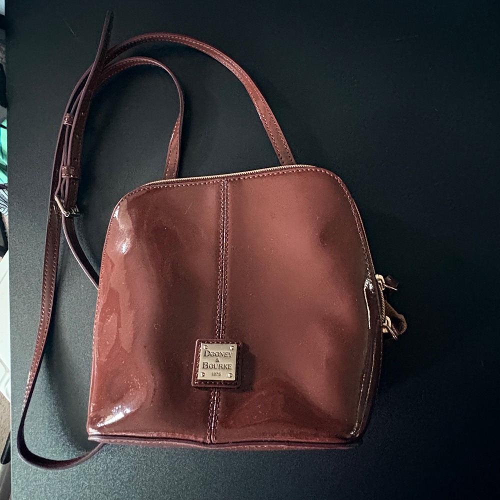 Dooney & Bourke Crossbody bag Patent leather chocolate brown gold hardware
